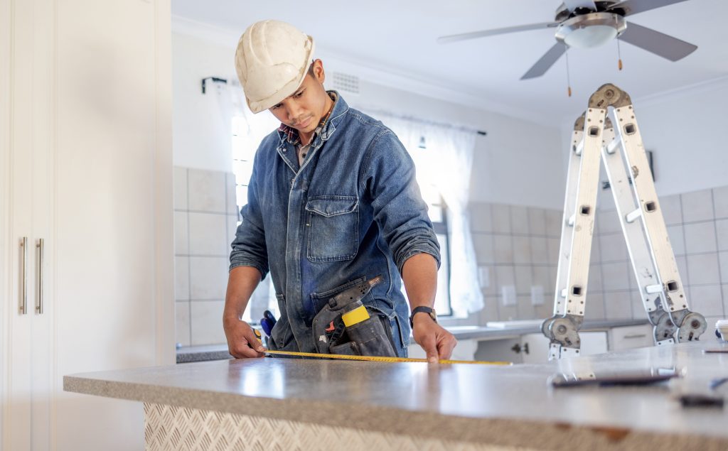 man doing kitchen renovations