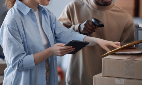 2 business owners checking number of packet or address